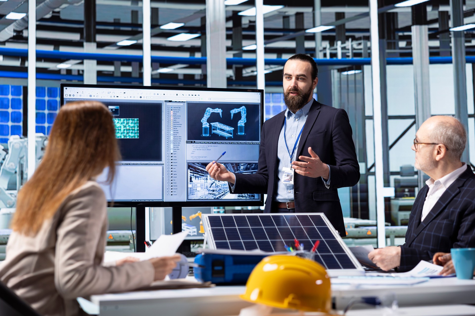 Photovoltaics factory executives planning strategic investment decisions